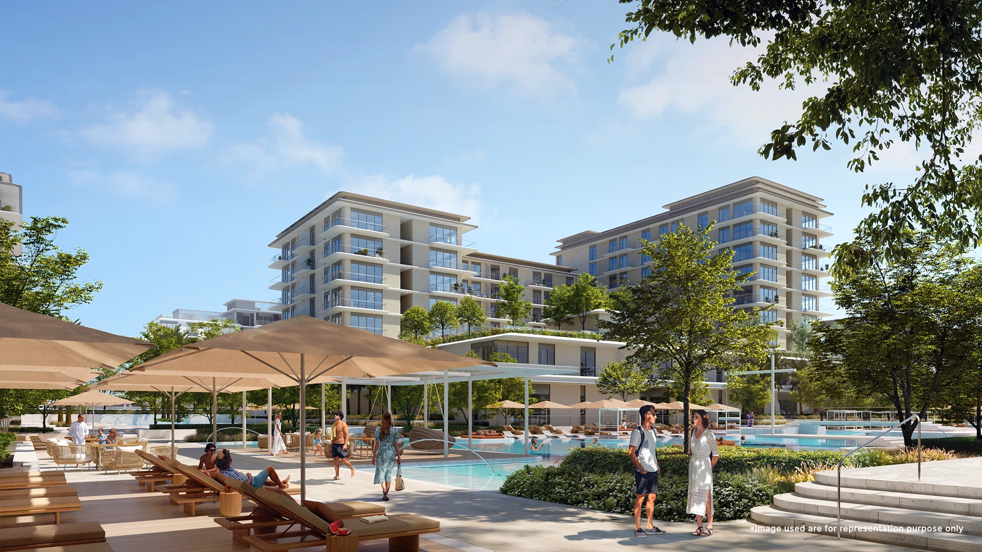 A vibrant and secured family pool zone with cabana seating and sunbath beds at Emaar Bayline