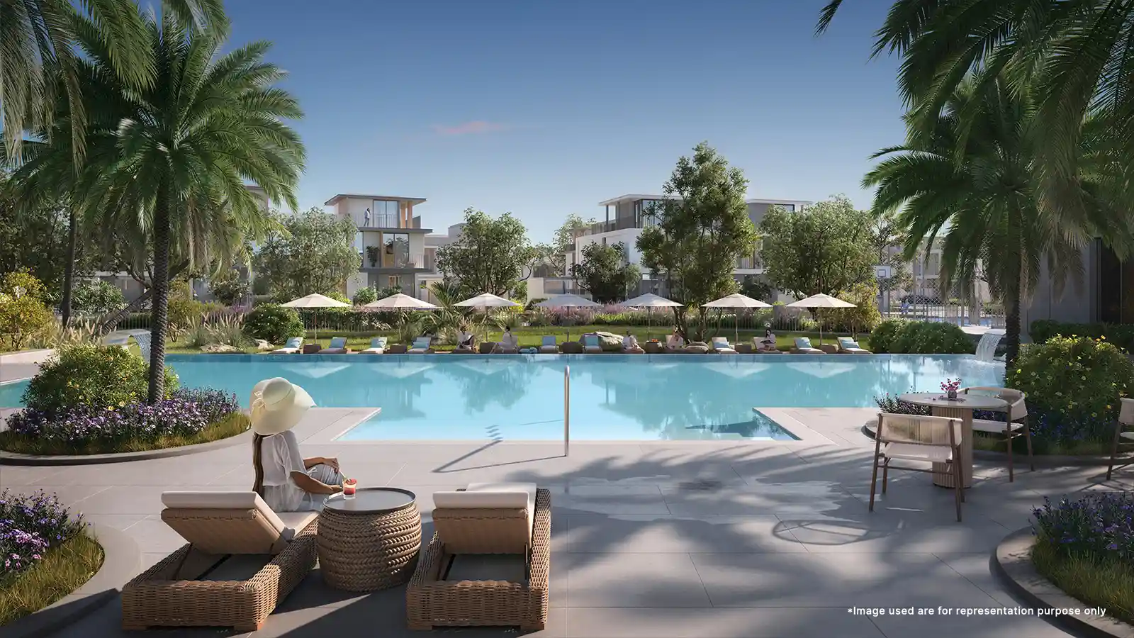 Serene Emaar Avena At The Valley pond area kids featuring lush greenery and tranquil water reflections